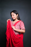 Ruby Red Ruffle Saree with Hand-Embroidered Blouse